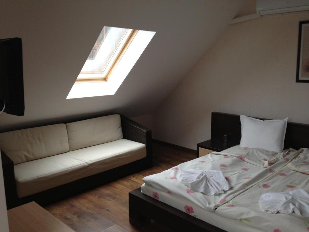 Kamelot Hotel Paszarel Szoba fotó