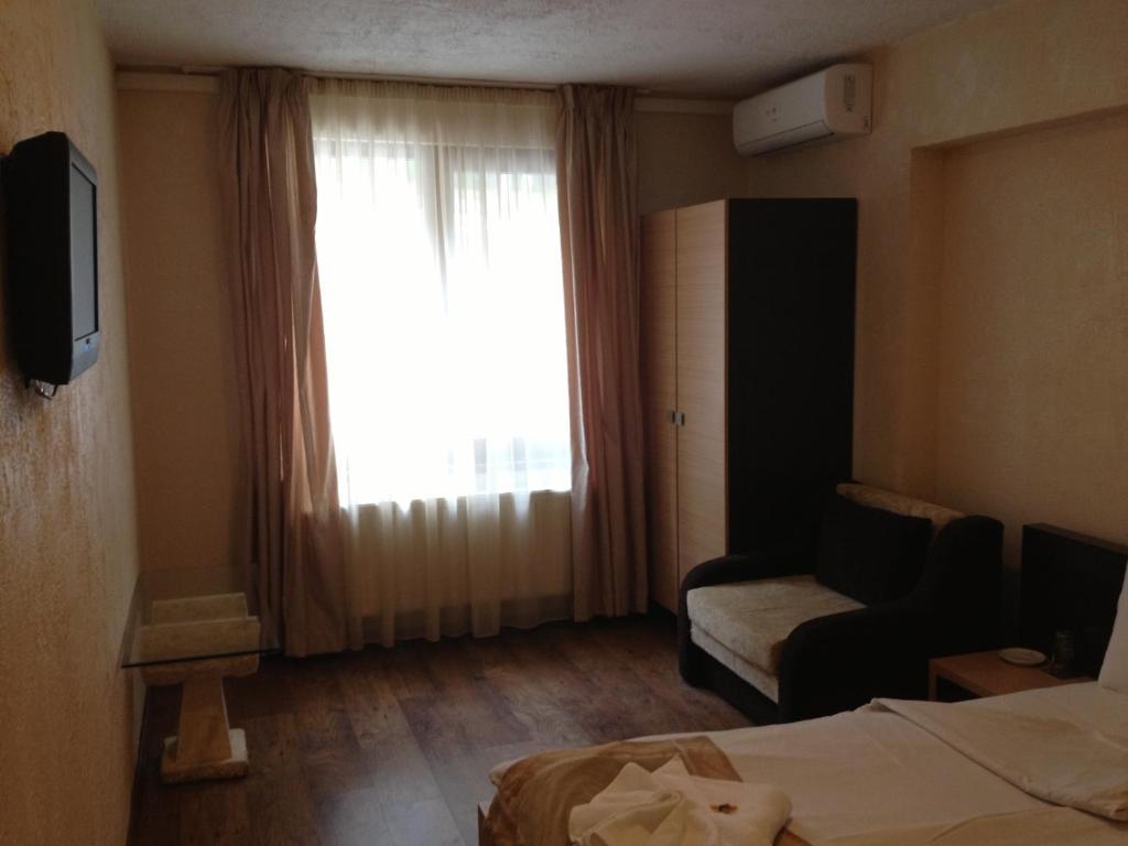 Kamelot Hotel Paszarel Szoba fotó